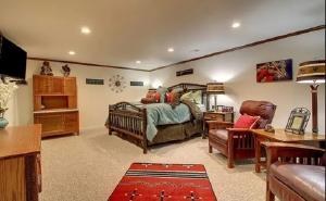 Sitting area with a bed and lounge space