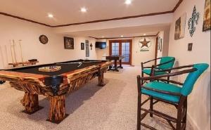 Game room with a pool table